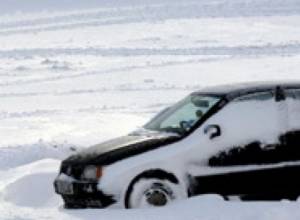 Chrysler gets stuck in snow near Alphabet Park in Armenia