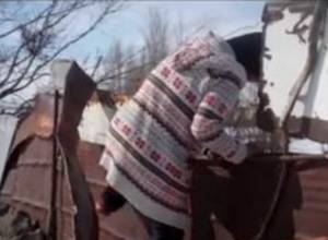  46-years old woman entered neighbor's house over the fence