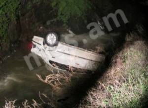 One injured as car rolls into river