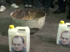 Children burn their paintings as a sign of protest 