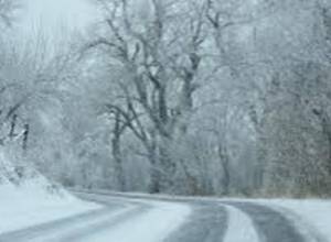 It is snowing on some roads