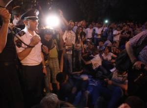 Protesters urge police official to join their sit-in