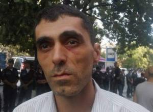 Policemen injured an action participant