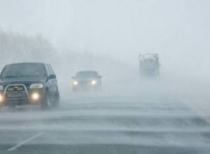 Snow and dense fog on the roads