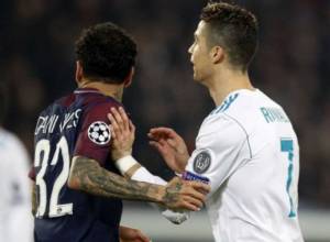 Dani Alves uses Ronaldo's shirt as handkerchief