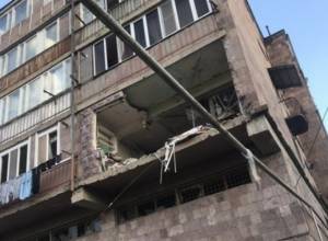 Explosion in residential building. Rescuers evacuate residents