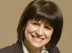 Из комитета переведена в министерство