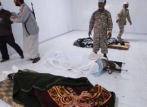 Gadhafi’s body under the sands of the desert