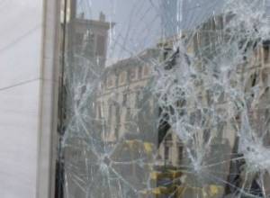 Breaks ex-wife’s house windows