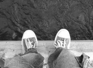 Young man jumps off bridge