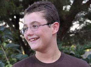 Sarkozy apologises for his son's tomato prank