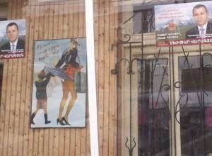 Half-naked women next to candidates