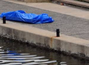 Corpse found under bridge
