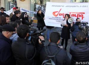 Politicians attend protest march in support of local daily