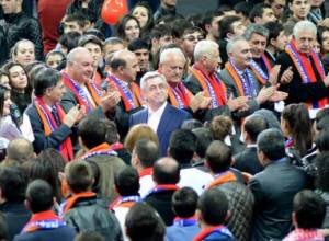 Officials stand in rows to meet Serzh Sargsyan