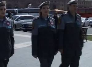 When female  police officer keeps the order