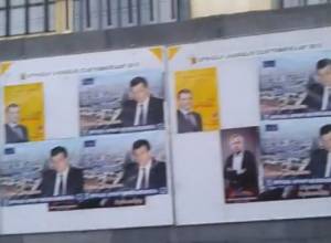 Posters affixed on university building