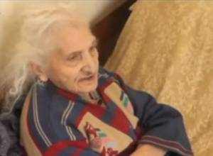 Elderly woman lives in solitude and ennui