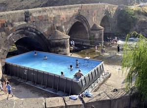 Swimming pool put in area of bridge monument